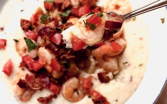 Pan Shrimp and Linguica Over Cheddar Bacon Grits